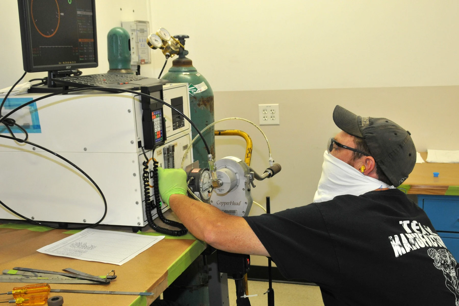 An experienced operator setting up an orbital welding system